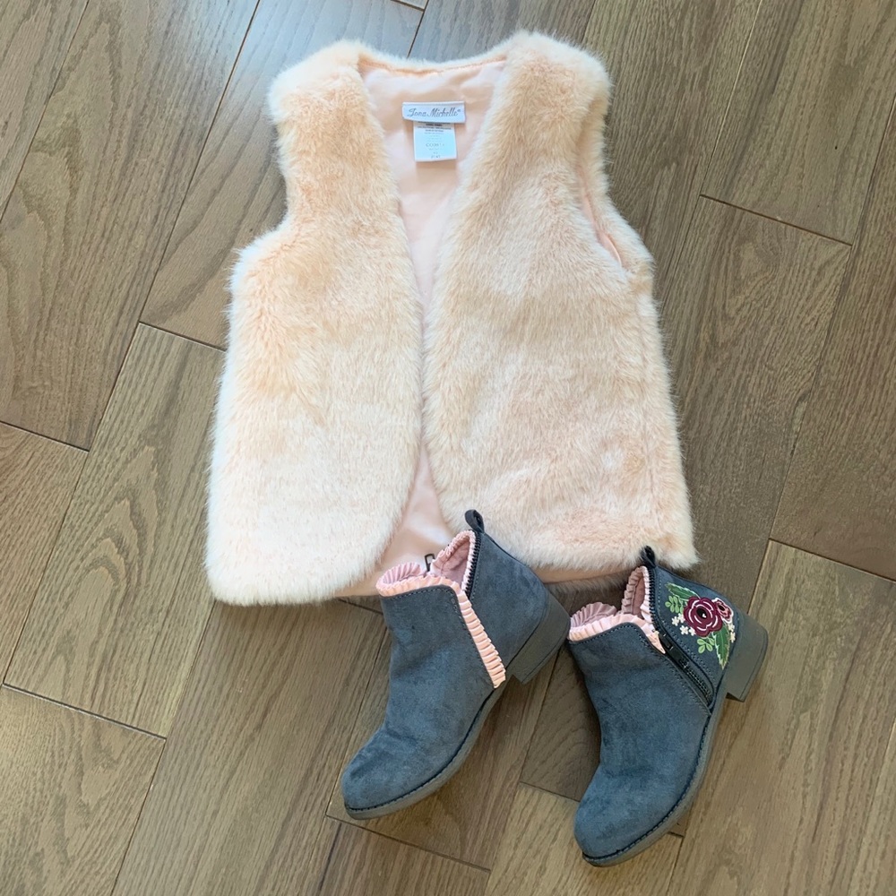 Girl’s pink faux fur vest.